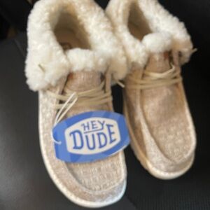 Hey Dude Tan and White Slippers with Cozy Lining. Women size 7.